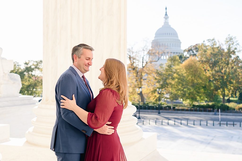 couple with capitol dome in the background