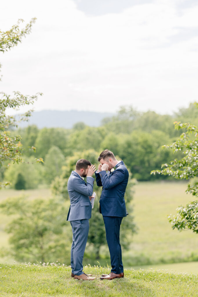 two grooms crying during first look